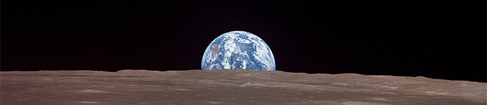 Earthrise over the surface of the Moon